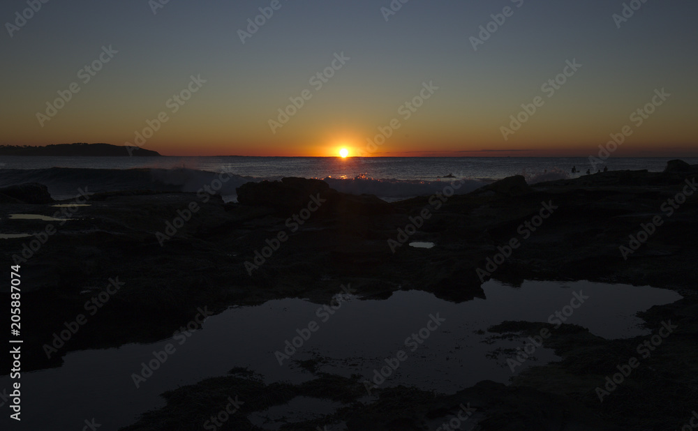 Fototapeta premium Beautiful Morning sunrise across Dee Why Rock Pool