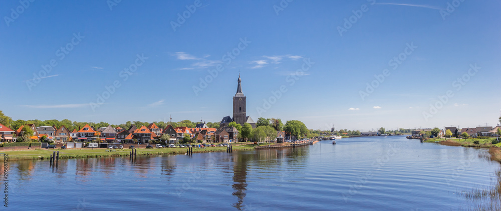 Panorama of church tower and river in Hasselt, The Netherlands