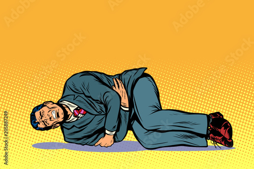 man lies hurts stomach