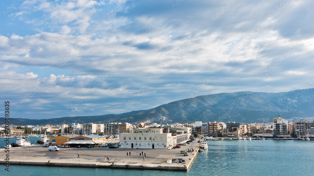 Volos port and harbor at morning with Pelion mountain in background, Greece