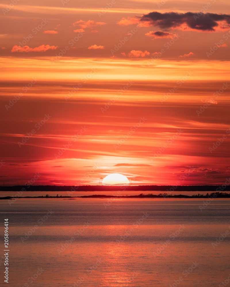 Scenic sunset with empty sea and colorful sky at evening in Finland