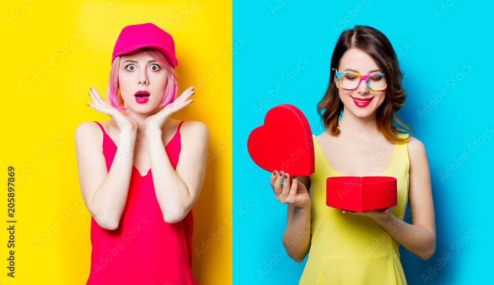 Two collage portraits of beautiful young woman with heart shaped gift on the wonderful blue background and in pink clothes on yellow background Two collage portraits of beautiful young woman with heart shaped gift on the wonderful blue background and in pink clothes on yellow background