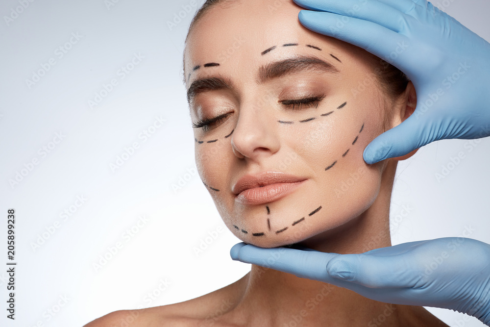 Young girl with closed eyes and puncture lines on face Young girl with closed eyes and puncture lines on face
