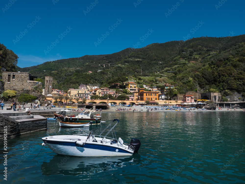 Monterosso village, bay and boats on a sunny spring day