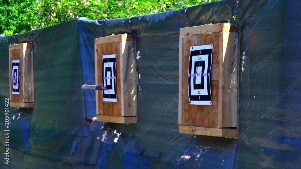 Throwing knives at the target from an openair distance, a competition