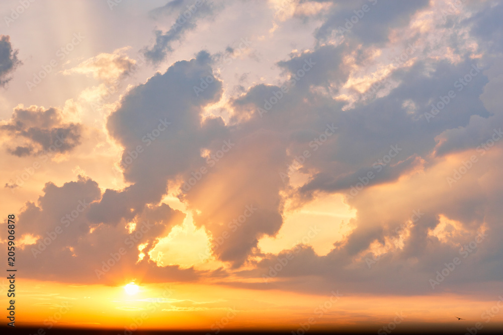 Sunset sky clouds, light rays and other atmospheric effect