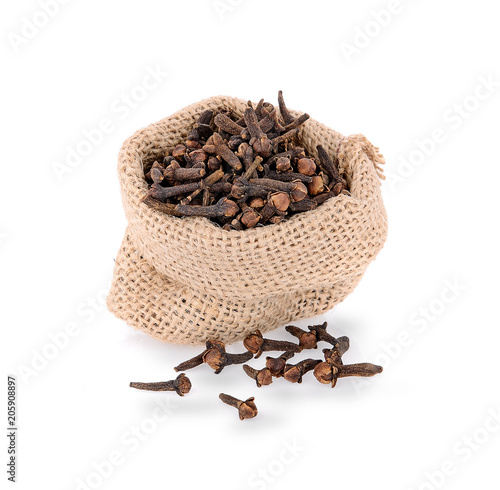 dry cloves on white background