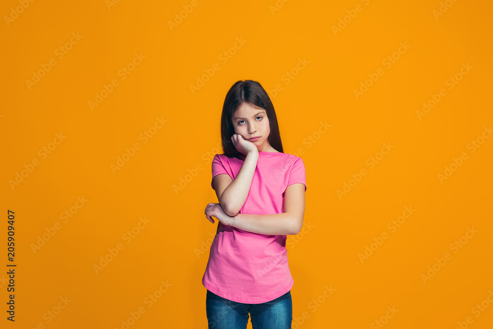 Young serious thoughtful teen girl. Doubt concept. Young serious thoughtful teen girl. Doubt concept.