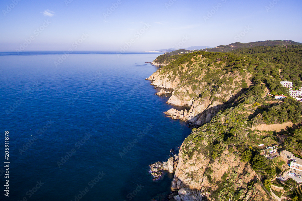 Aerial view of the awesome cliffs of Costa Brava. Tossa de Mar, Girona. Aerial view of the awesome cliffs of Costa Brava. Tossa de Mar, Girona.