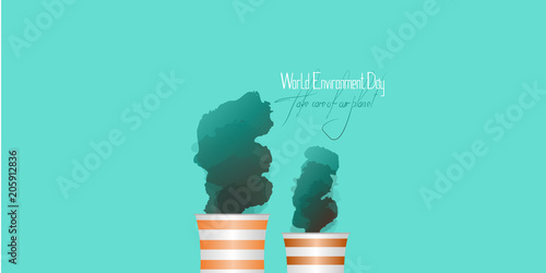 World environment day. Lettering-take care of our planet. The pipes of the plant produce smoke.  The factory pollutes nature.