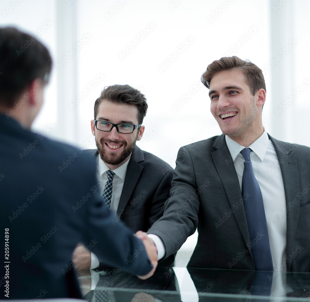 close up.businessman welcomes new business partner close up.businessman welcomes new business partner