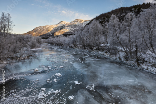 frozen river, municipality of Skanland, Lofoten Island, Norway, Europe photo