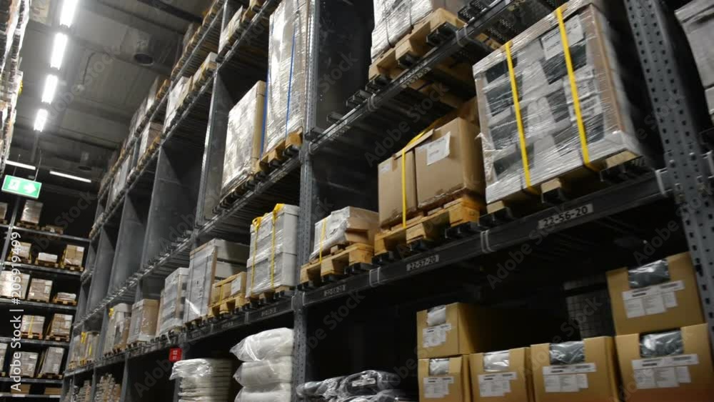 Camera travels inside a large store. Warehouse shipping. Camera travels inside a large store. Warehouse shipping.