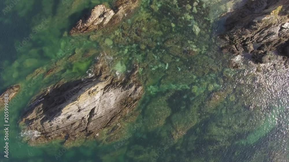 Blue Ocean Waves Crashing over Rocks, Aerial Drone Footage Blue Ocean Waves Crashing over Rocks, Aerial Drone Footage