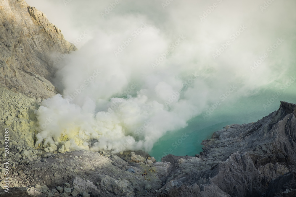 Fototapeta premium The sulfur smoke's eruptions. Kawah Ijen at Indonesia.