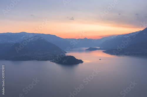 Wallpaper Mural A boat is going to reach the village of Bellagio at sunset. Como Lake, Lombardy, Italy, Europe. Torontodigital.ca