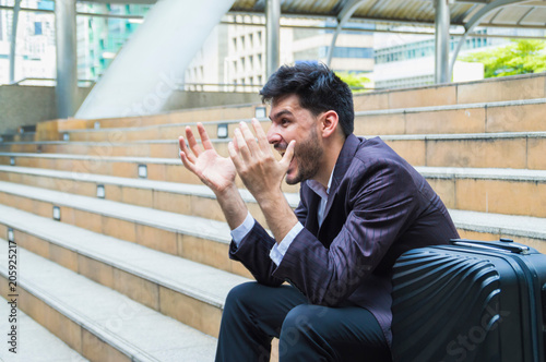 Young businessmen look good on the outside background.