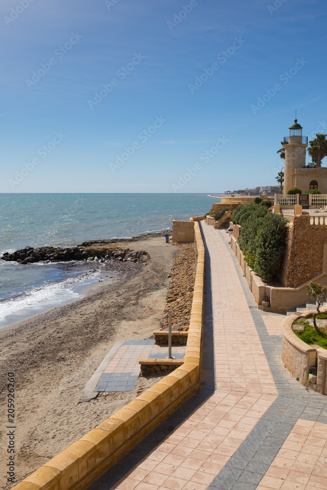 Coast path and Roquetas del Mar lighthouse Costa de Almería, Andalucía Spain 