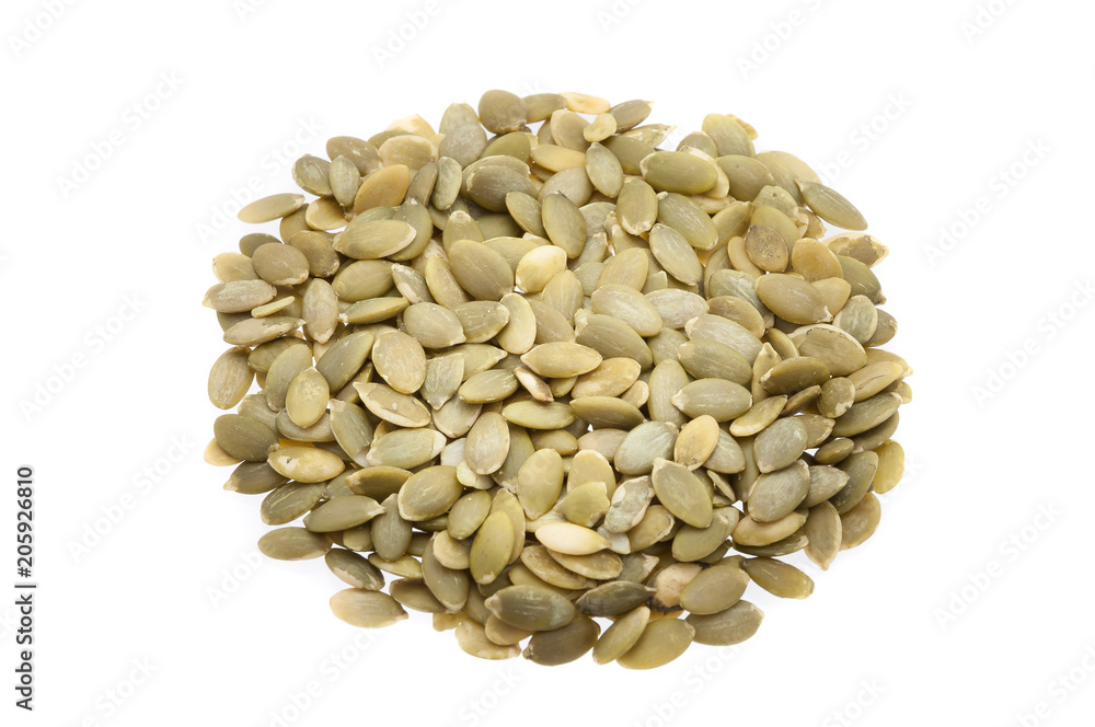 Sunflower seeds in the center, in the shape of a circle, on a white background. isolated. Sunflower seeds in the center, in the shape of a circle, on a white background. isolated.