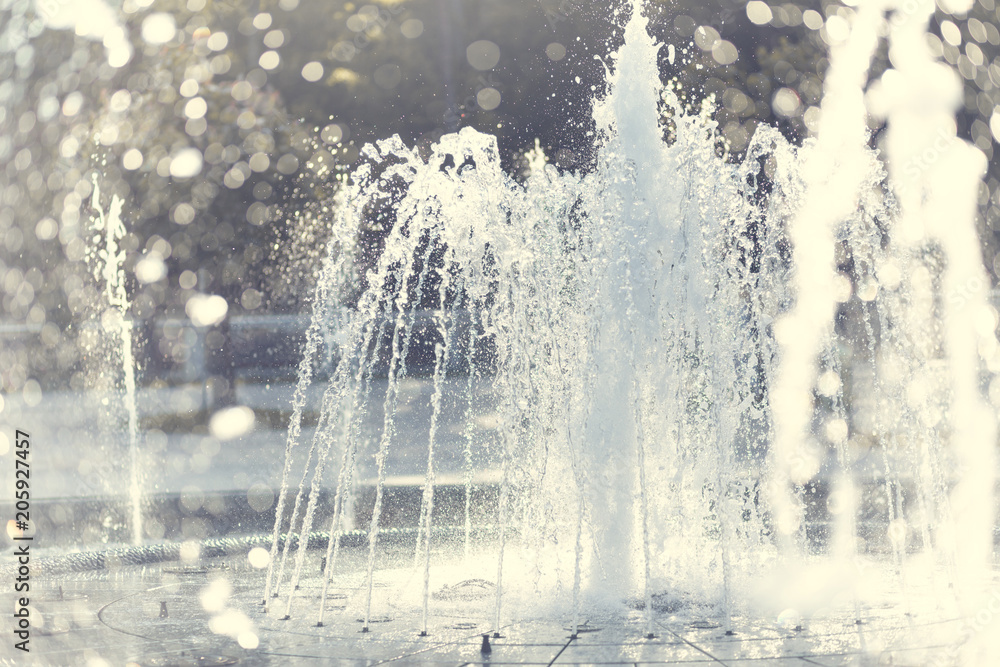 Spurting water from a fountain. Shallow depth of field. Spurting water from a fountain. Shallow depth of field.