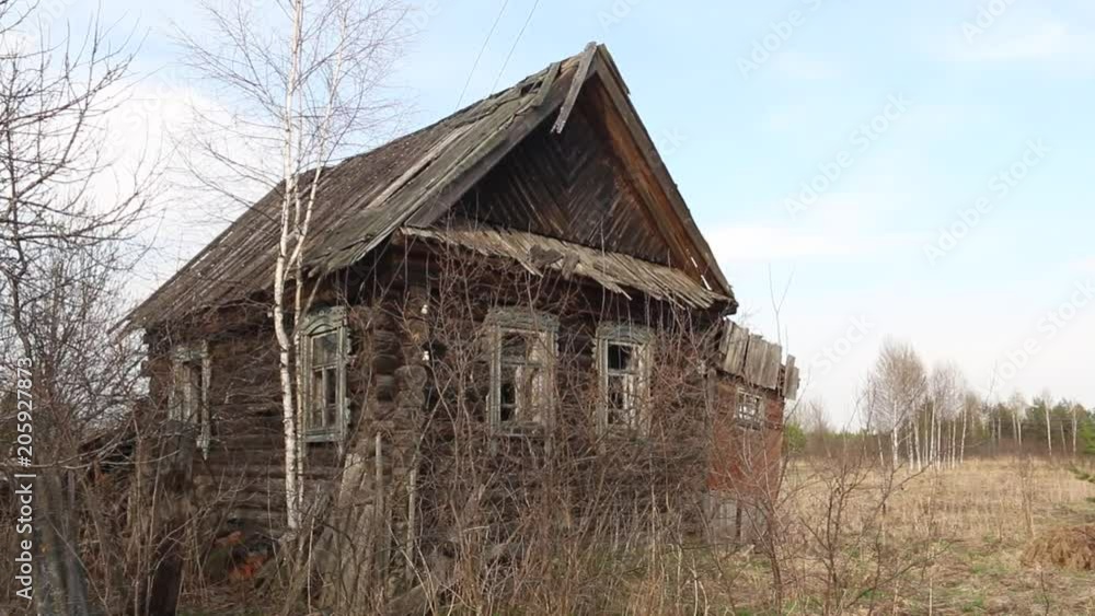 Old Russian village abandoned house on an abandoned field. Old Russian village abandoned house on an abandoned field.