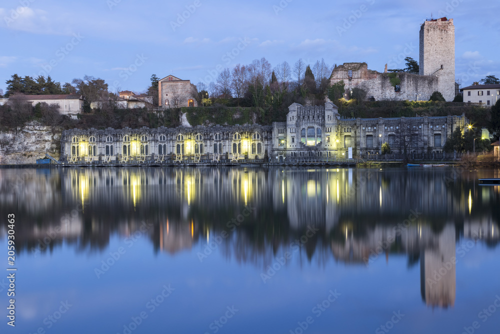 View of the Castello Visconteo and Centrale Idroelettrica Taccani on the shores of river Adda. Trezzo sull'Adda, Milan, Lombardy, Italy. View of the Castello Visconteo and Centrale Idroelettrica Taccani on the shores of river Adda. Trezzo sull'Adda, Milan, Lombardy, Italy.