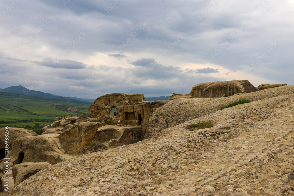Fototapeta premium Old cave city Uplistsikhe in Caucasus mountains, Georgia