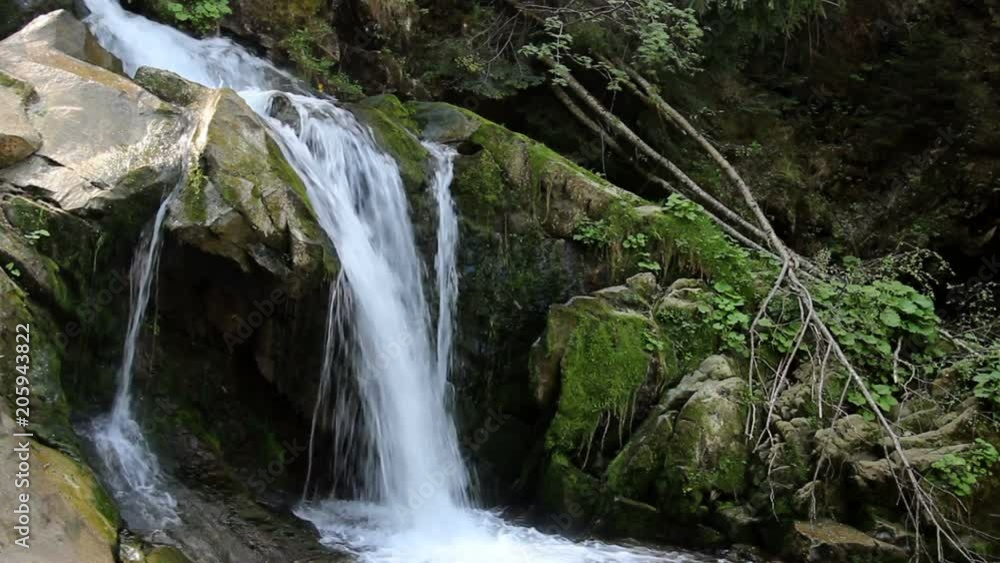 view of Kamianetskyi waterfall is located on the Kamianka river, national park Skolevski beskidy, Lviv region of Western Ukraine view of Kamianetskyi waterfall is located on the Kamianka river, national park Skolevski beskidy, Lviv region of Western Ukraine
