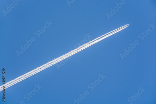 Large passenger plane against the blue sky