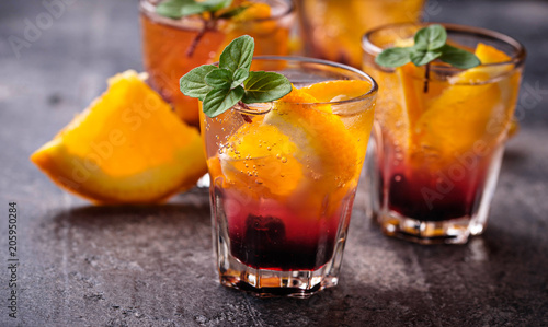 Summer  drink with orange and berries