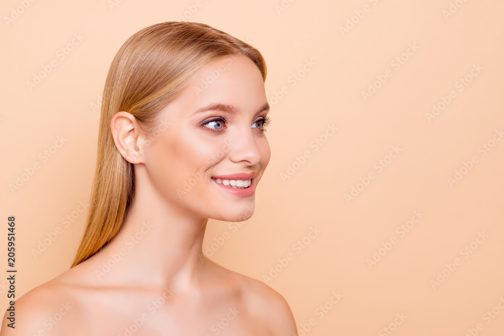 Portrait with copy space empty place of half turned pretty, charming, sexy, nude, positive, cheerful girl with perfect face skin, isolated on beige background, rejuvenation, advertisement concept Portrait with copy space empty place of half turned pretty, charming, sexy, nude, positive, cheerful girl with perfect face skin, isolated on beige background, rejuvenation, advertisement concept