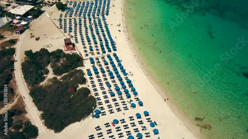 Surprisingly beautiful beach in cyprus. White sand, lawns, sea, shooting with copter.