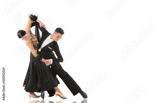 Canvas Print ballroom dance couple in a dance pose isolated on white