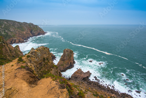 view of the ocean and hills of Cabo da Roca, Portugal