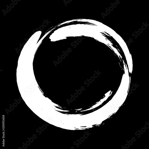 A white circle with a brush on a black background photo