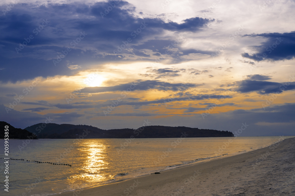 Amazing sunset on paradise tropical island beach