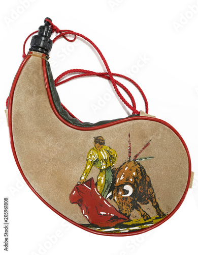 Bullfighter bota bag or wineskin, is a traditional Spanish leather liquid receptacle, canteen isolated on white photo