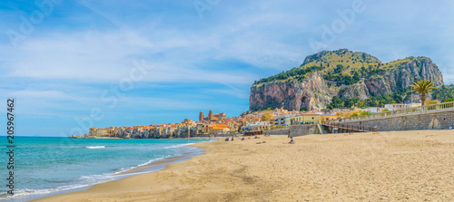 Fototapeta Naklejka Na Ścianę i Meble -  View of a beach in the sicilian city Cefalu, Italy
