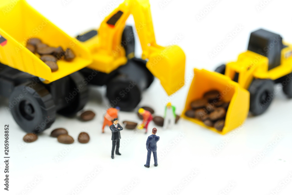 Miniature people : professional construction engineer with businessmans,industrial engineering business concept Miniature people : professional construction engineer with businessmans,industrial engineering business concept