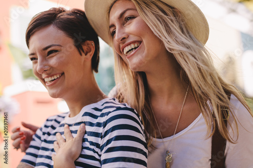 Cheerful friends having fun outdoors