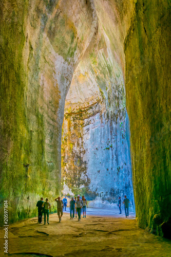 Orecchio di Dionisio cave in the Neapolis Archaeological Park in Syracuse, Sicily, Italy photo