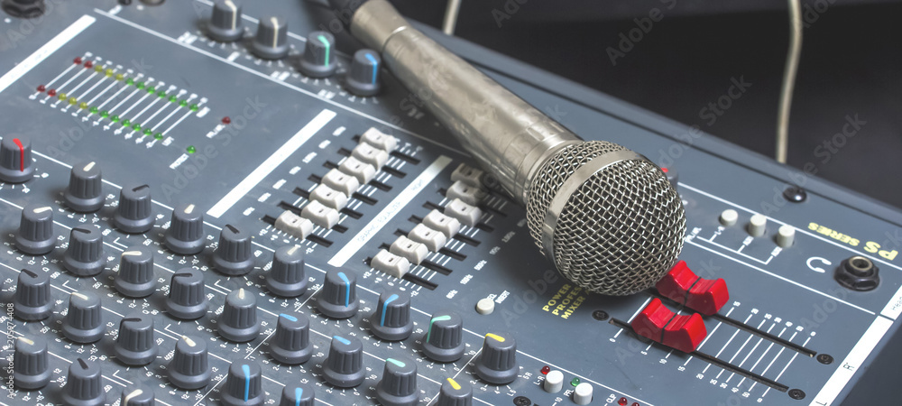 Microphones and mixers on the table. Microphones and mixers on the table.