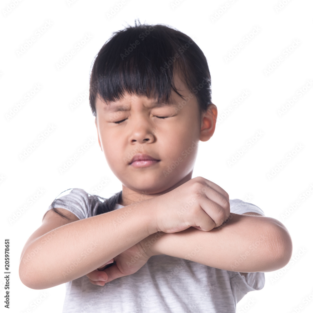 Portrait of a young asian girl scratching her arm. Portrait of a young asian girl scratching her arm.