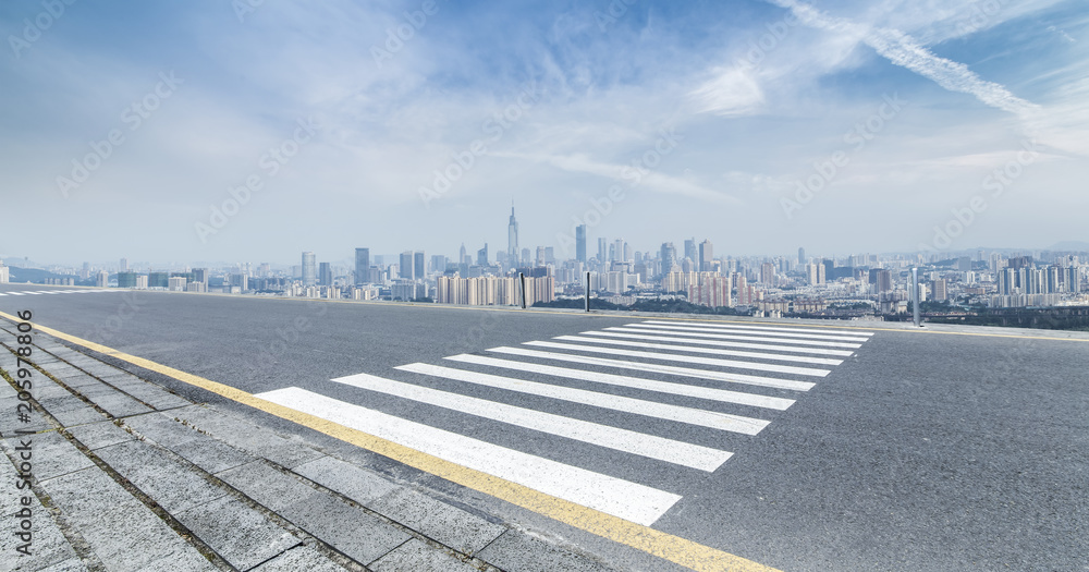 Fototapeta premium Panoramic skyline and modern business office buildings with empty road,empty concrete square floor