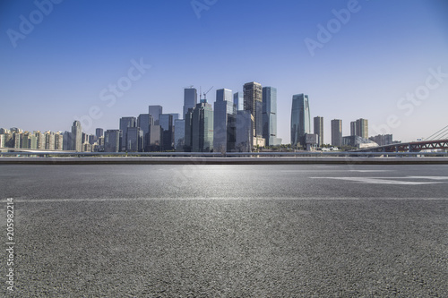Panoramic skyline and buildings with empty road © MyCreative