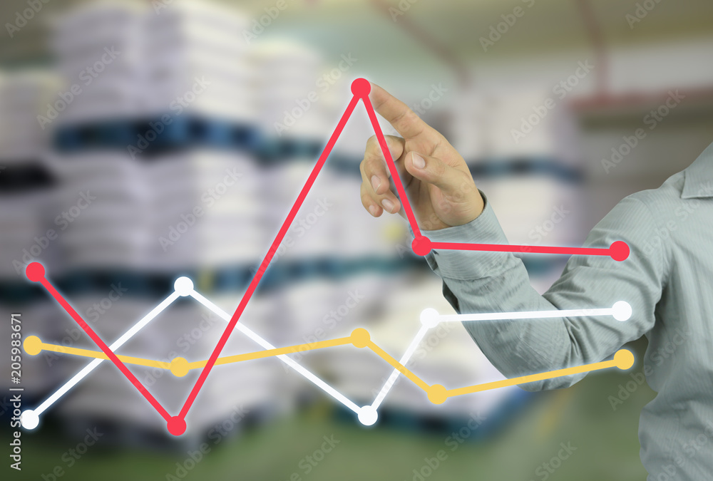 businessman hand pointing to top of profitability graph in your work concept business.