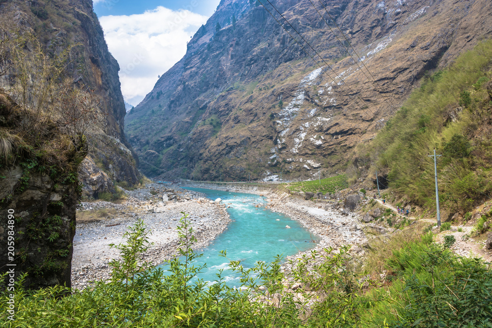 Mountain river in a deep gorge in the Himalayas.