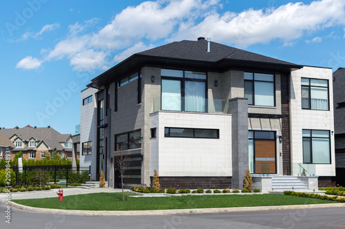 Photography Luxury house in Montreal, Canada against blue sky