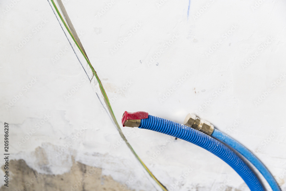 Water pipes made of polypropylene PEX in the wall, plumbing in the