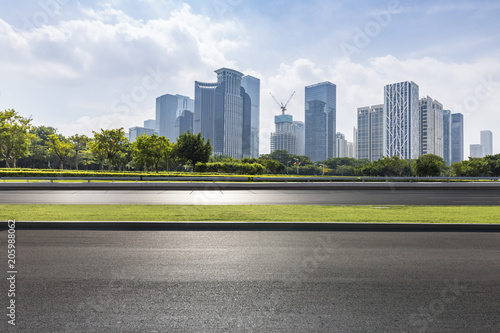 modern business office buildings with empty road,empty concrete square floor © MyCreative